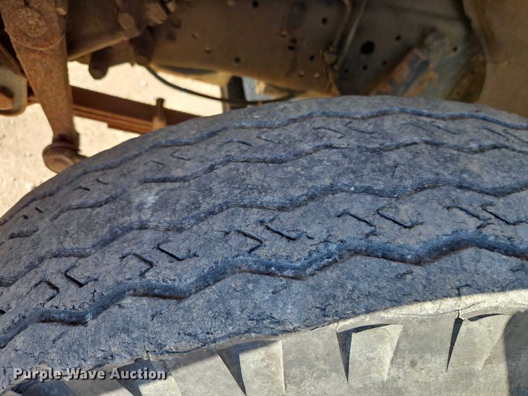 image for item EB8394 1986 GMC C6 dump flatbed truck