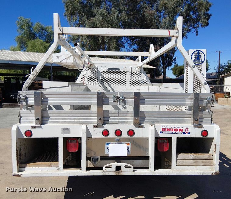 image for item EC1250 2019 RAM 4500HD Crew Cab flatbed truck