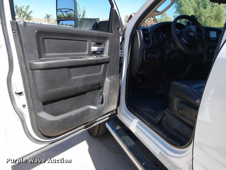 image for item EC1250 2019 RAM 4500HD Crew Cab flatbed truck