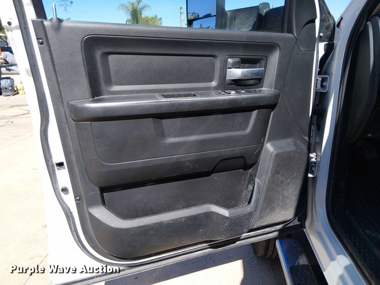 image for item EC1250 2019 RAM 4500HD Crew Cab flatbed truck