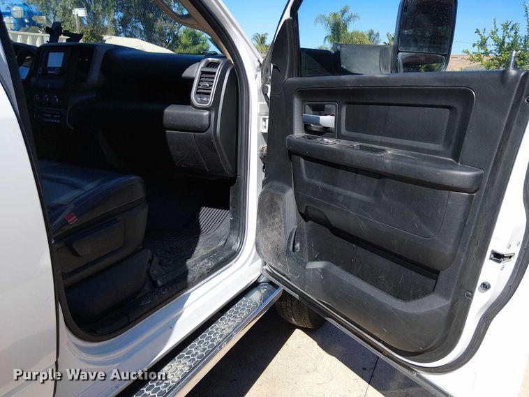 image for item EC1250 2019 RAM 4500HD Crew Cab flatbed truck