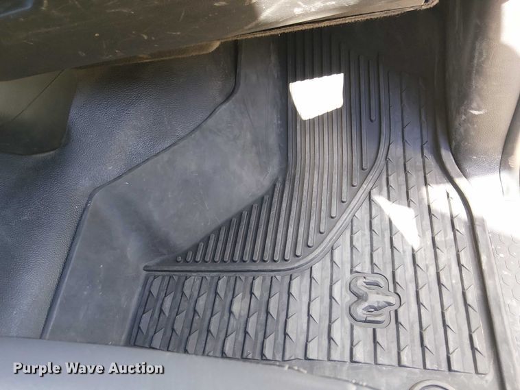 image for item EC1250 2019 RAM 4500HD Crew Cab flatbed truck