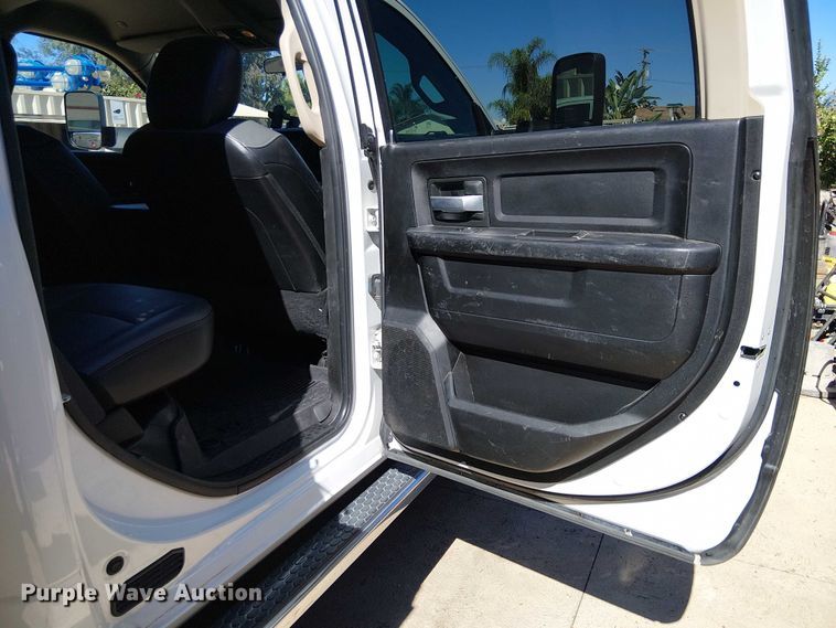 image for item EC1250 2019 RAM 4500HD Crew Cab flatbed truck