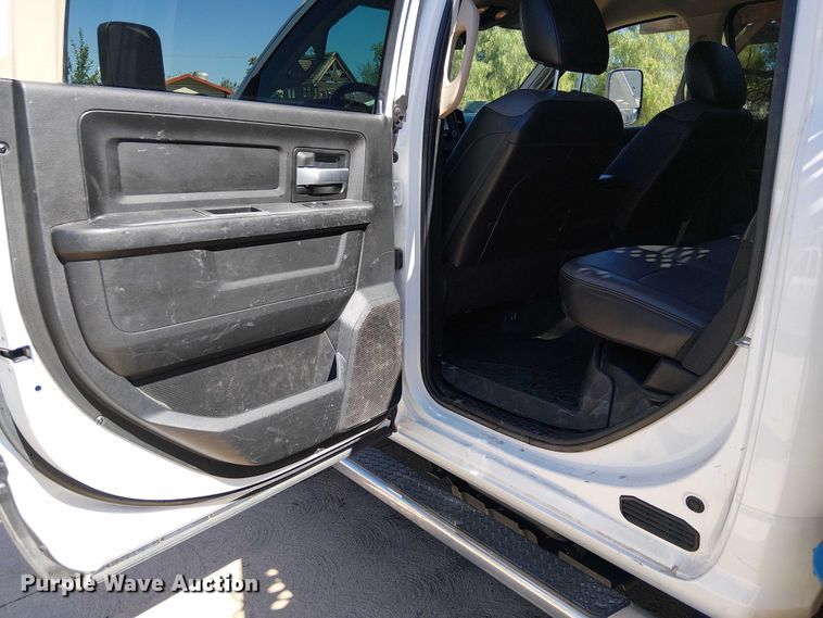 image for item EC1250 2019 RAM 4500HD Crew Cab flatbed truck