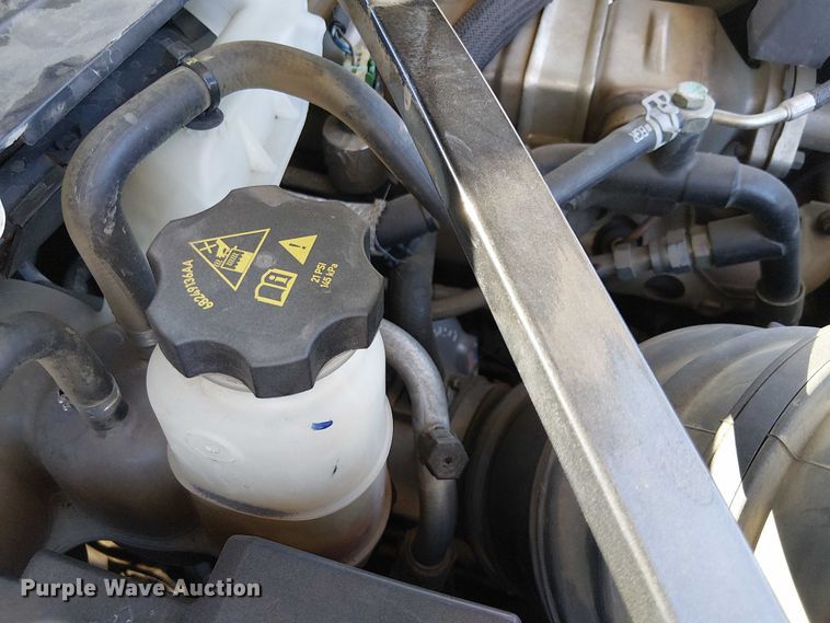 image for item EC1250 2019 RAM 4500HD Crew Cab flatbed truck