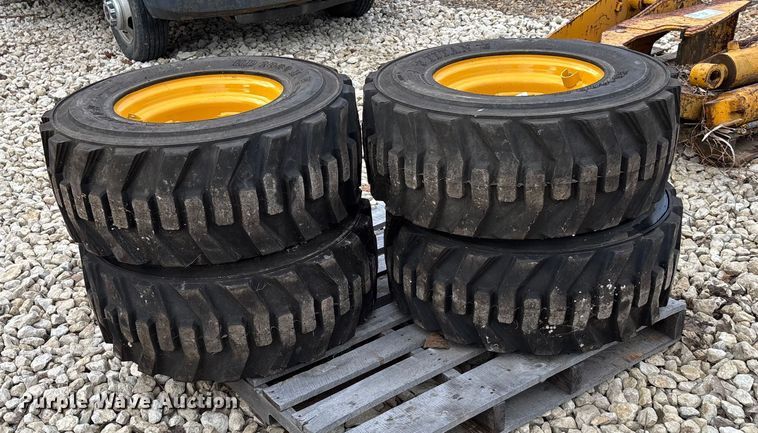 image for item EE4125 (4) skid steer tires and wheels