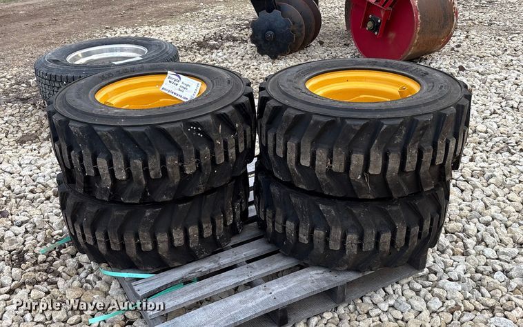 image for item EE4125 (4) skid steer tires and wheels