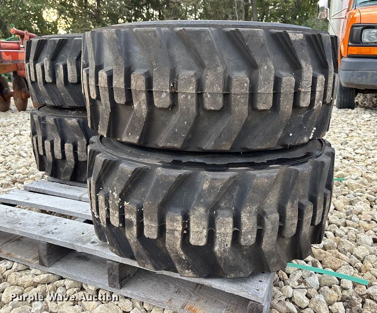 image for item EE4125 (4) skid steer tires and wheels