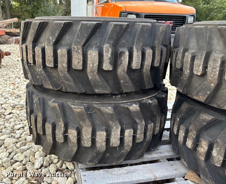 image for item EE4125 (4) skid steer tires and wheels