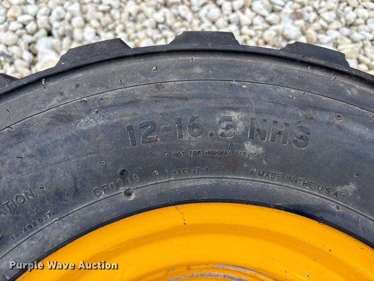 image for item EE4125 (4) skid steer tires and wheels