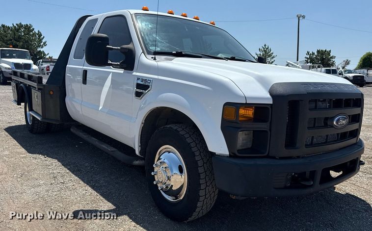 image for item EG6056 2008 Ford F350 Super Duty SuperCab flatbed pickup truck