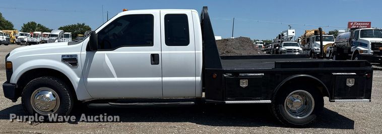 image for item EG6056 2008 Ford F350 Super Duty SuperCab flatbed pickup truck