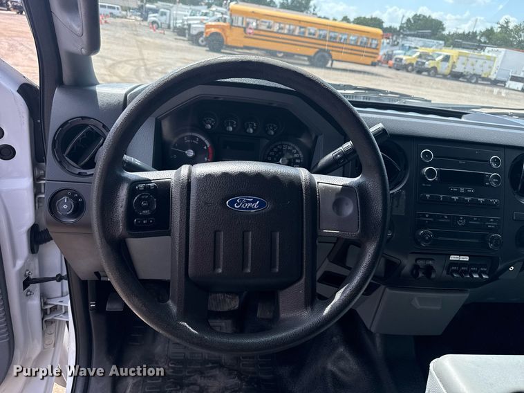 image for item EG6062 2012 Ford F550 Super Duty flatbed pickup truck