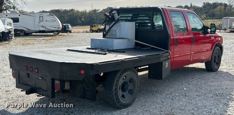 image for item ET3394 2006 Ford F350 Super Duty XL Crew Cab flatbed pickup truck