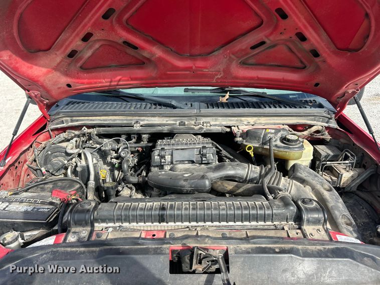 image for item ET3394 2006 Ford F350 Super Duty XL Crew Cab flatbed pickup truck