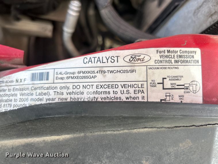 image for item ET3394 2006 Ford F350 Super Duty XL Crew Cab flatbed pickup truck