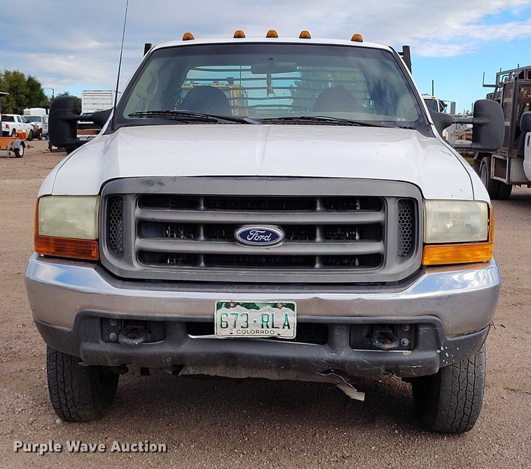 image for item IP9720 2000 Ford F350 Super Duty SuperCab dump flatbed pickup truck