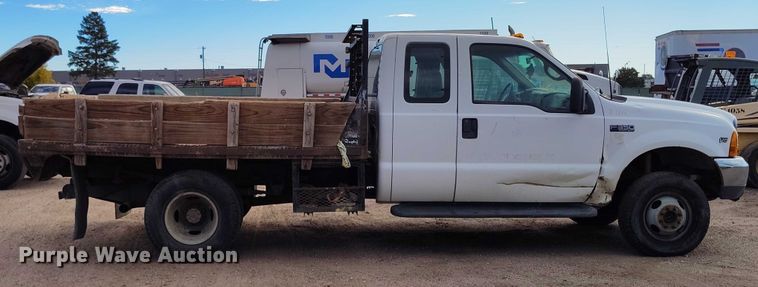 image for item IP9720 2000 Ford F350 Super Duty SuperCab dump flatbed pickup truck