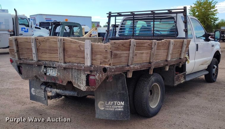 image for item IP9720 2000 Ford F350 Super Duty SuperCab dump flatbed pickup truck