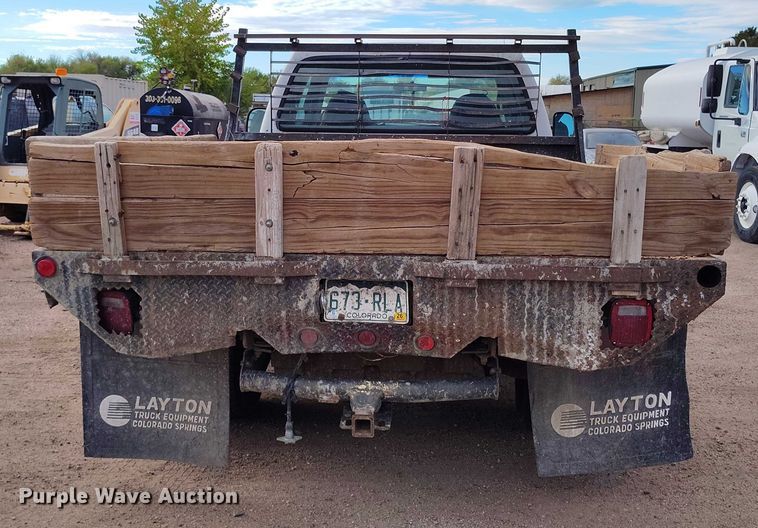 image for item IP9720 2000 Ford F350 Super Duty SuperCab dump flatbed pickup truck