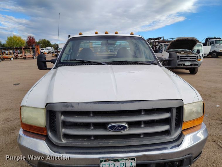 image for item IP9720 2000 Ford F350 Super Duty SuperCab dump flatbed pickup truck