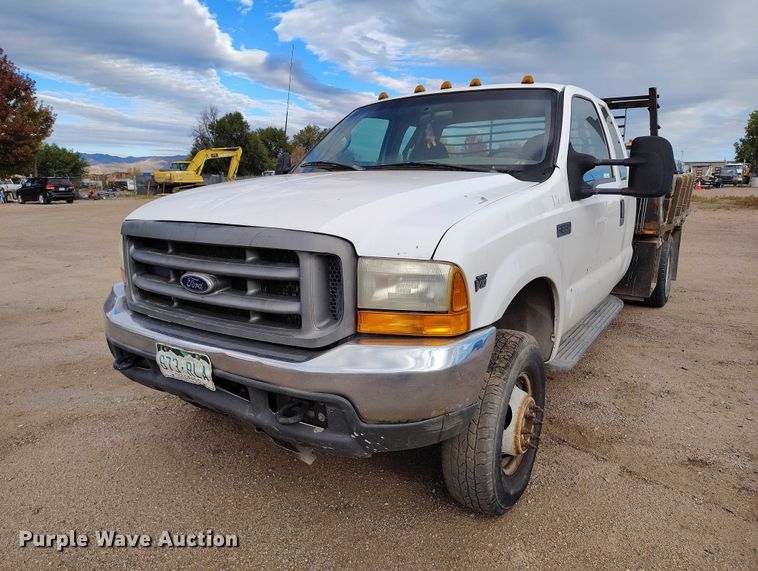 image for item IP9720 2000 Ford F350 Super Duty SuperCab dump flatbed pickup truck