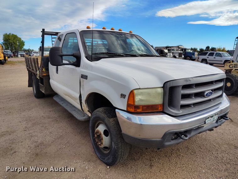 image for item IP9720 2000 Ford F350 Super Duty SuperCab dump flatbed pickup truck