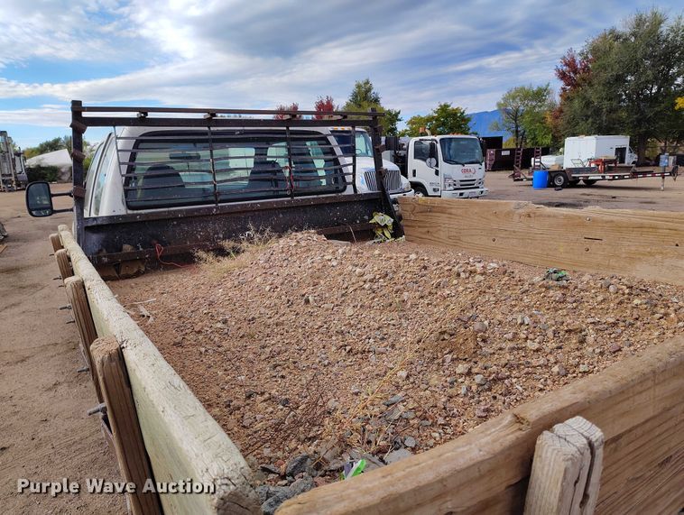 image for item IP9720 2000 Ford F350 Super Duty SuperCab dump flatbed pickup truck