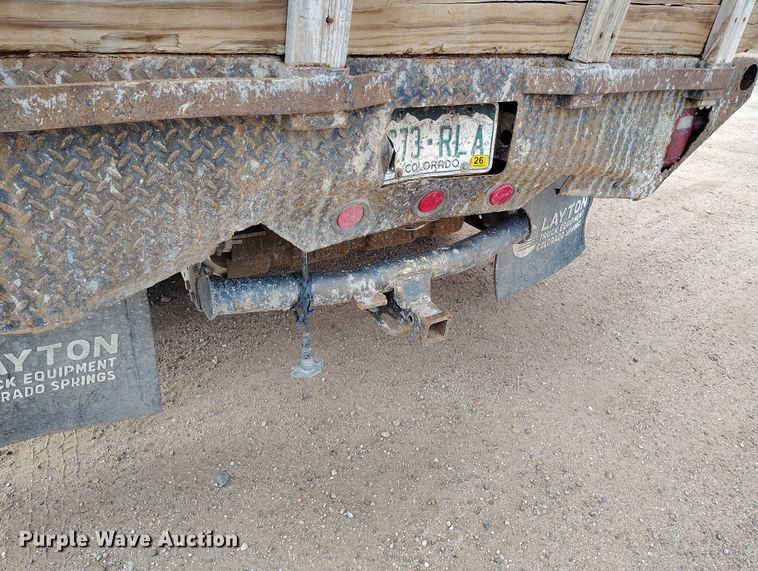 image for item IP9720 2000 Ford F350 Super Duty SuperCab dump flatbed pickup truck