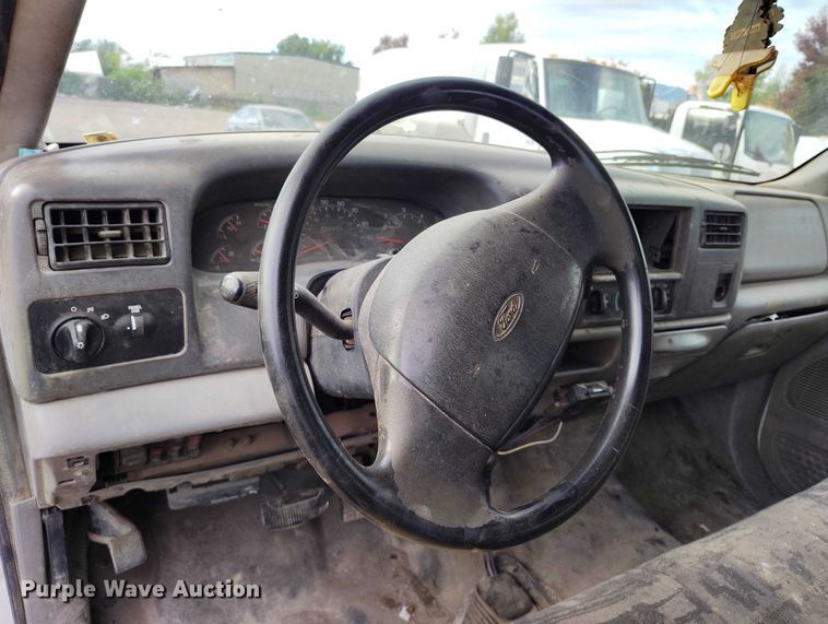 image for item IP9720 2000 Ford F350 Super Duty SuperCab dump flatbed pickup truck