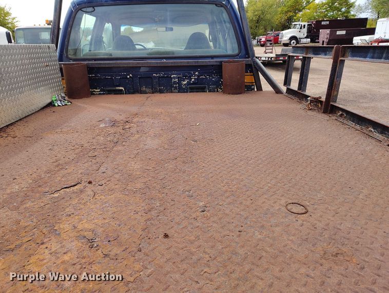 image for item IP9724 1999 Ford F550 Super Duty flatbed truck