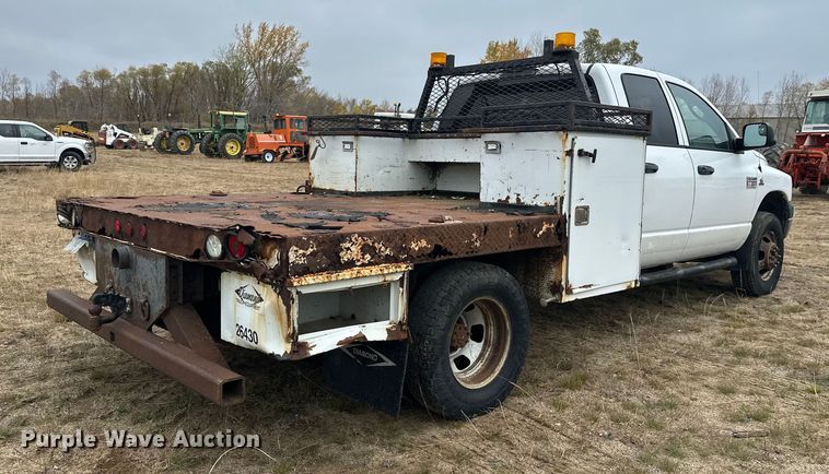 image for item DW4330 2008 Dodge Ram 3500 Quad Cab flatbed pickup truck