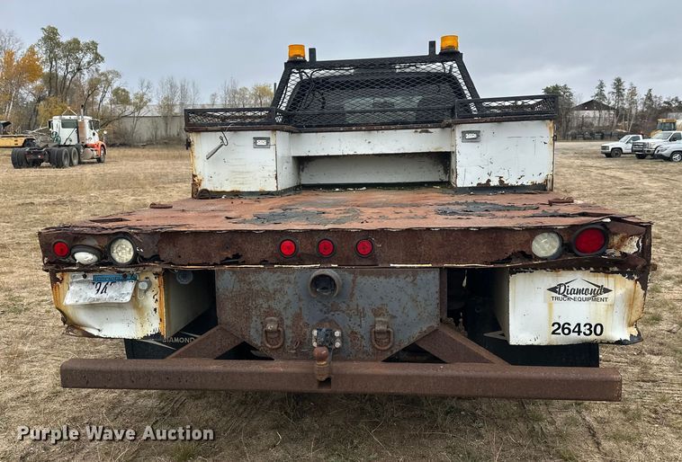 image for item DW4330 2008 Dodge Ram 3500 Quad Cab flatbed pickup truck