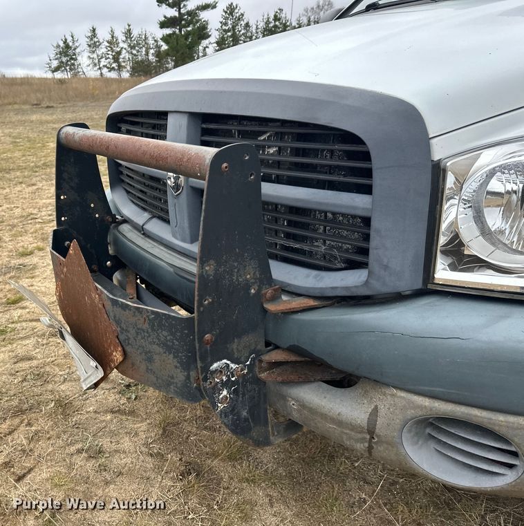 image for item DW4330 2008 Dodge Ram 3500 Quad Cab flatbed pickup truck