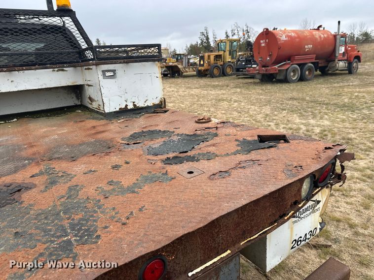 image for item DW4330 2008 Dodge Ram 3500 Quad Cab flatbed pickup truck