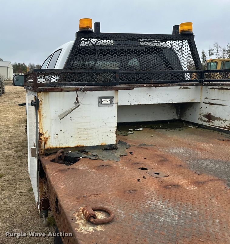 image for item DW4330 2008 Dodge Ram 3500 Quad Cab flatbed pickup truck