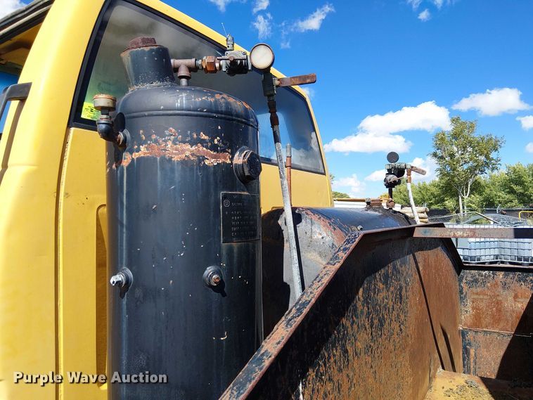 image for item EC1241 1990 GMC C7 asphalt patch truck