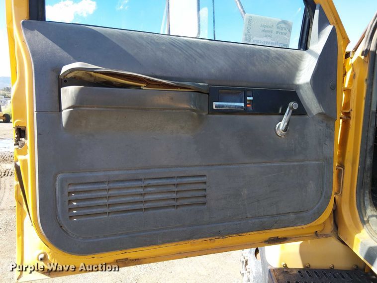 image for item EC1241 1990 GMC C7 asphalt patch truck