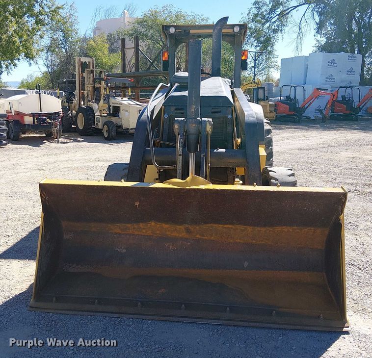 image for item EC1255 2012 John Deere 210K landscape tractor