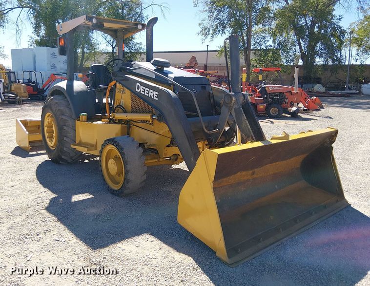 image for item EC1255 2012 John Deere 210K landscape tractor