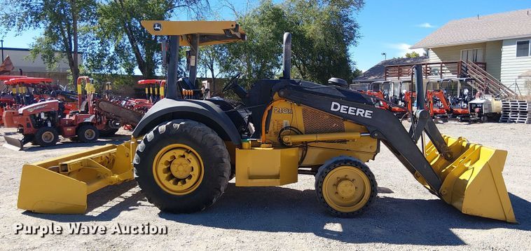 image for item EC1255 2012 John Deere 210K landscape tractor