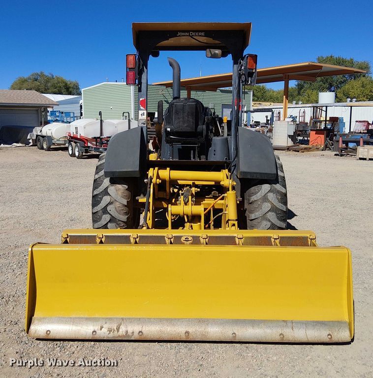 image for item EC1255 2012 John Deere 210K landscape tractor