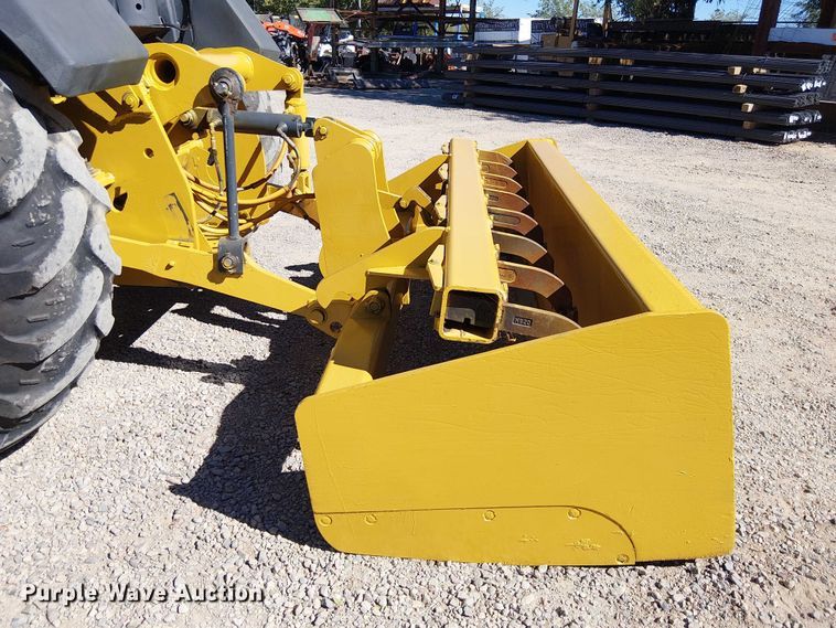 image for item EC1255 2012 John Deere 210K landscape tractor