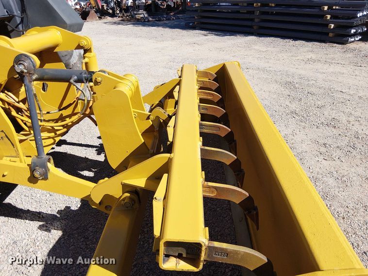 image for item EC1255 2012 John Deere 210K landscape tractor