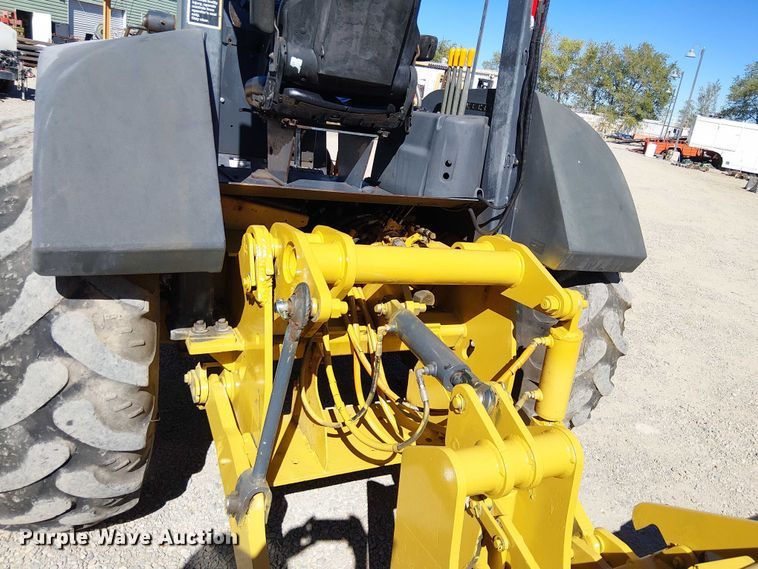 image for item EC1255 2012 John Deere 210K landscape tractor