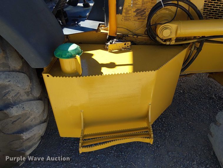 image for item EC1255 2012 John Deere 210K landscape tractor