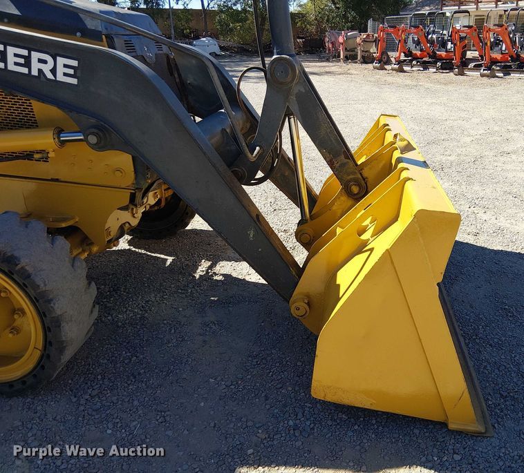 image for item EC1255 2012 John Deere 210K landscape tractor