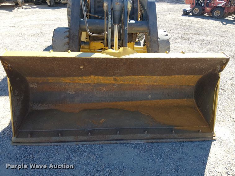 image for item EC1255 2012 John Deere 210K landscape tractor