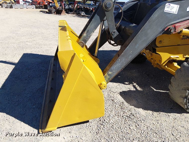 image for item EC1255 2012 John Deere 210K landscape tractor