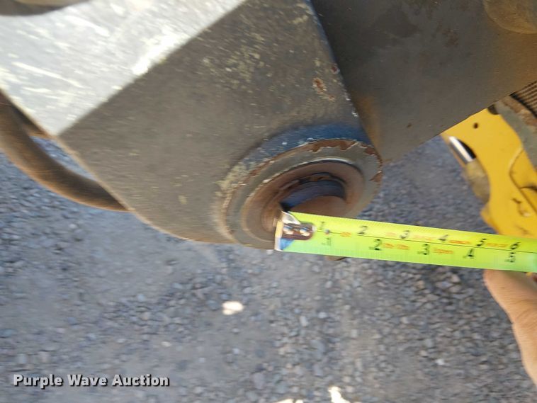 image for item EC1255 2012 John Deere 210K landscape tractor